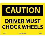 CAUTION DRIVER MUST CHOCK WHEELS SIGN